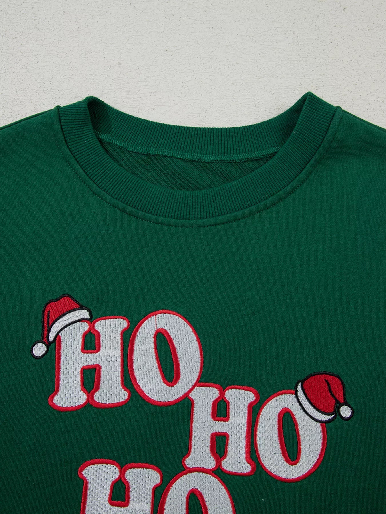 Embroidered Letter Christmas Round Neck Sweatshirt designed for comfort and style at Lookzlike