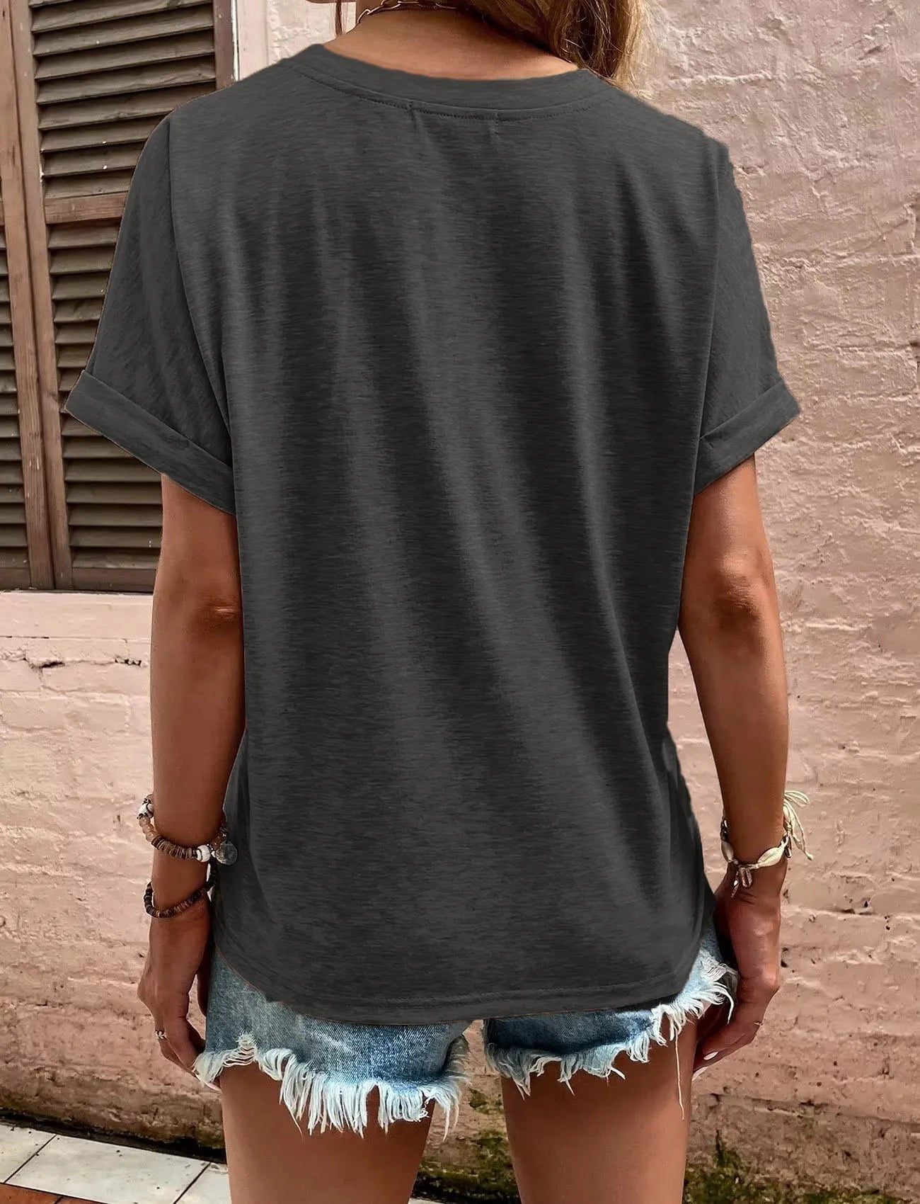 Full Size Notched Short Rolled Sleeve Top Plus Size designed for comfort and style at Lookzlike