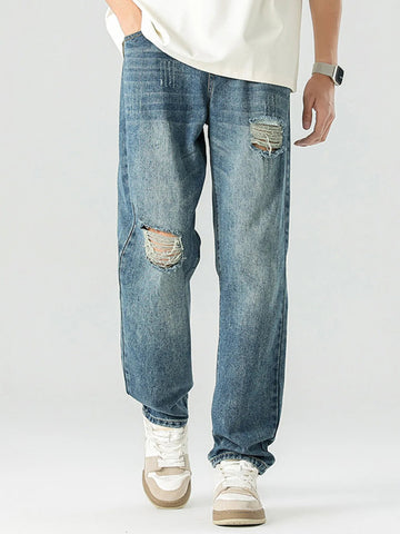 Men's Distressed Relaxed Fit Jeans designed for comfort and style at Lookzlike