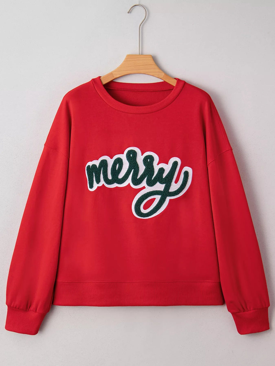 Merry Script Holiday Christmas Graphic Sweatshirt designed for comfort and style at Lookzlike