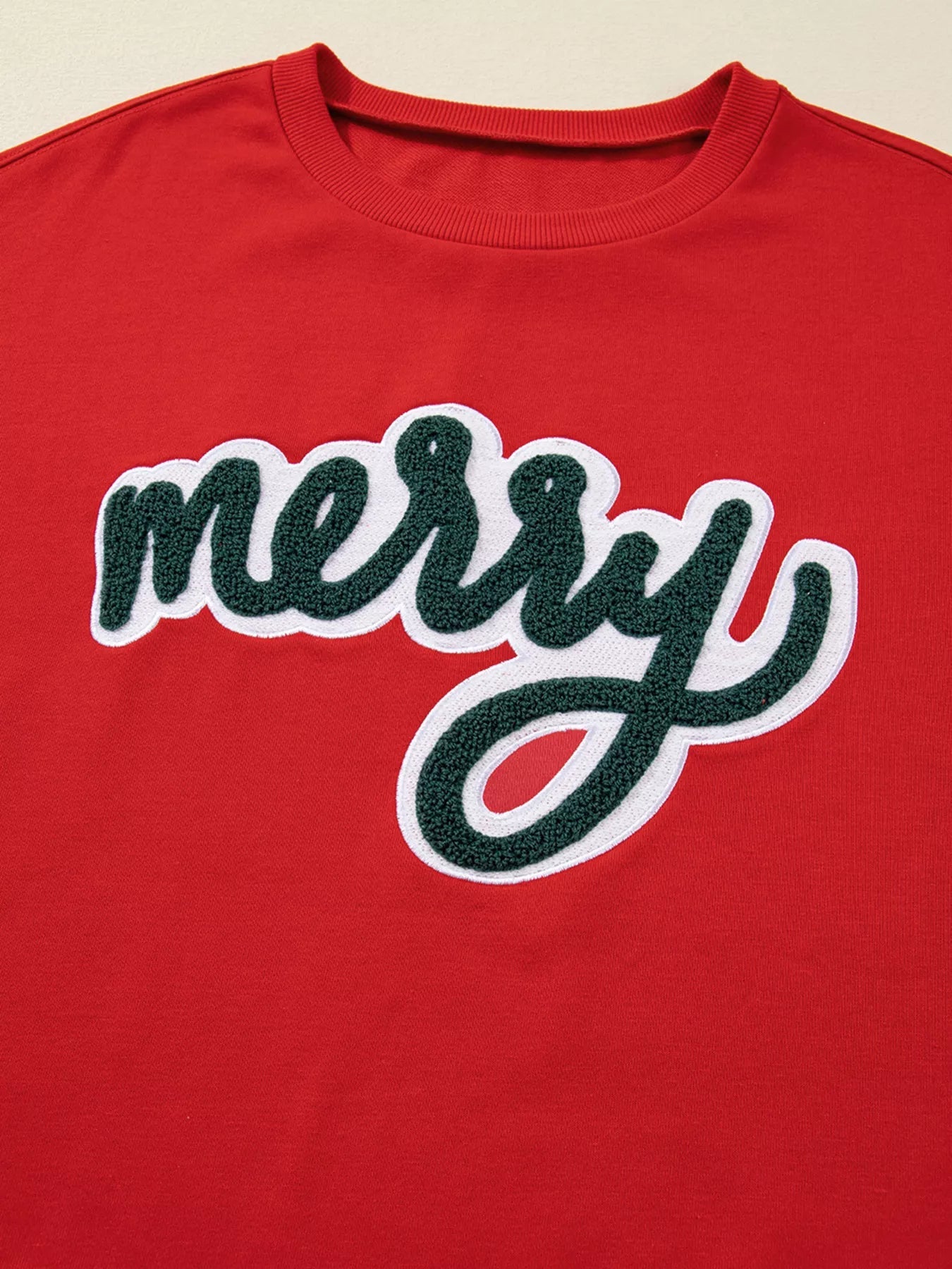 Merry Script Holiday Christmas Graphic Sweatshirt designed for comfort and style at Lookzlike
