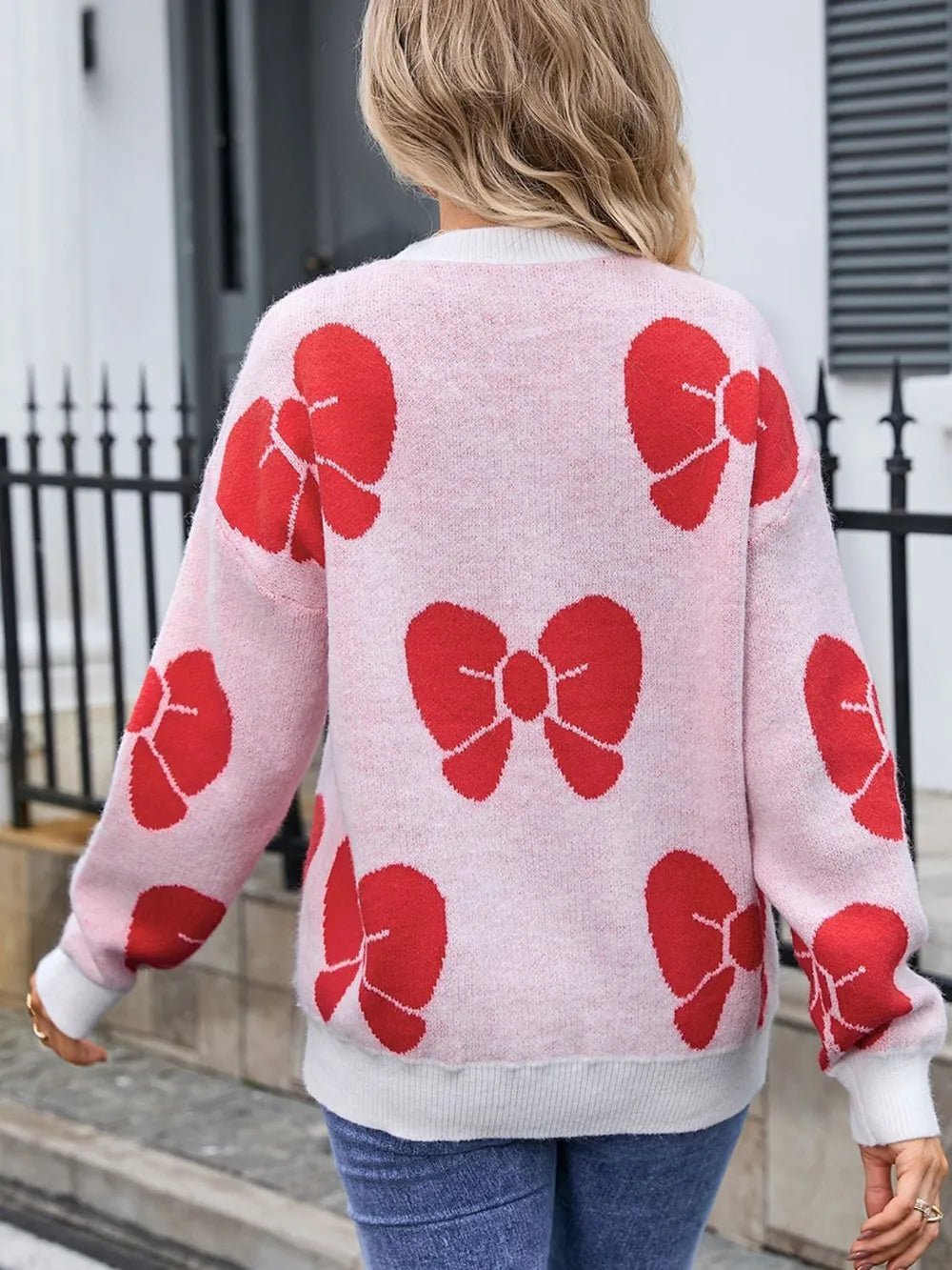 Angel Wings Bow Round Neck Dropped Shoulder Sweater designed for comfort and style at Lookzlike