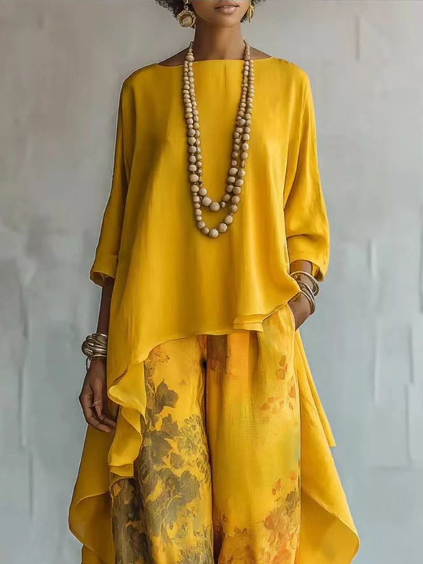 Asymmetrical Hem Top and Floral Pants Set designed for comfort and style at Lookzlike