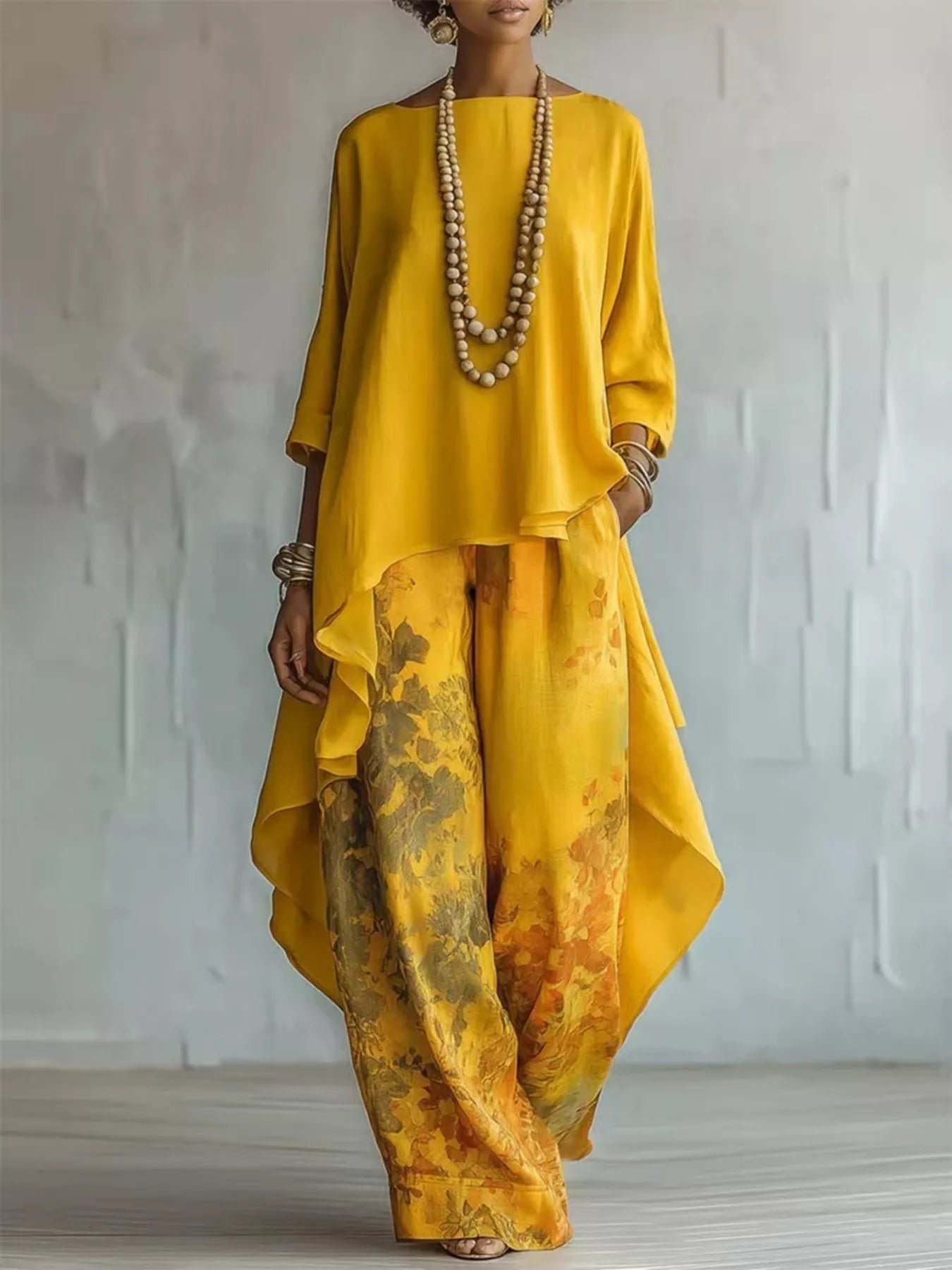 Asymmetrical Hem Top and Floral Pants Set designed for comfort and style at Lookzlike