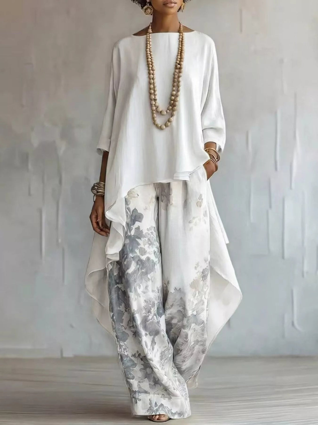Asymmetrical Hem Top and Floral Pants Set designed for comfort and style at Lookzlike