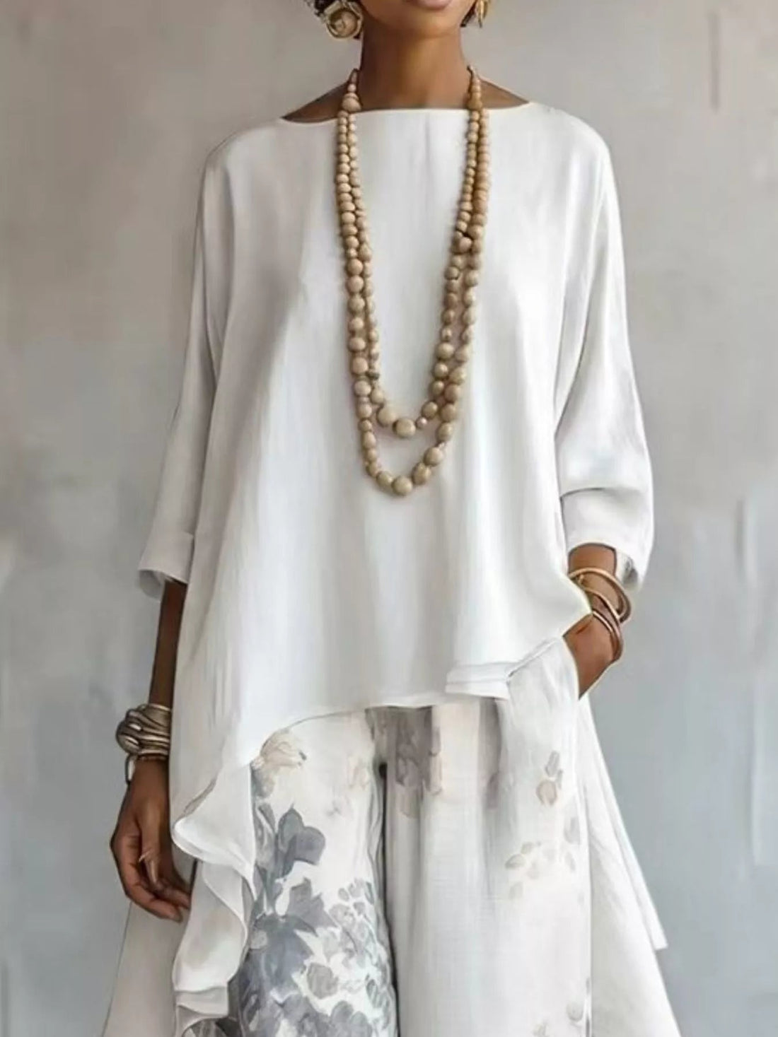 Asymmetrical Hem Top and Floral Pants Set designed for comfort and style at Lookzlike
