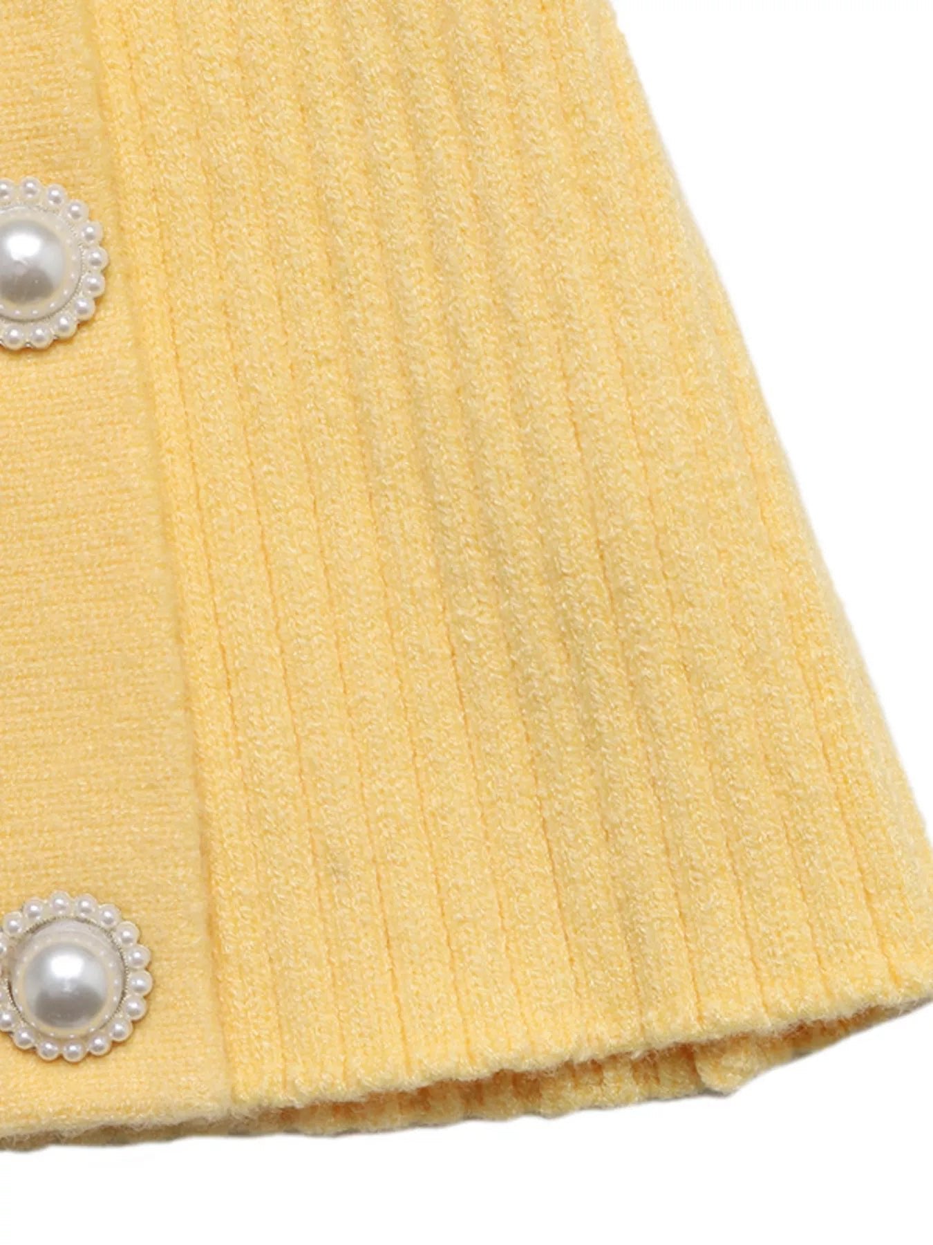 Asymmetrical Ribbed Button Up Cardigan designed for comfort and style at Lookzlike