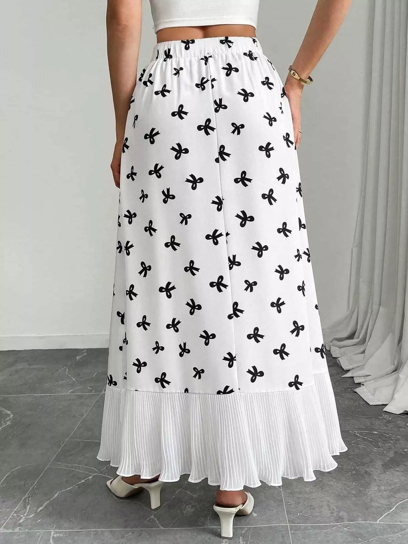 Bow Print Ruffle Hem Flowy Maxi Skirt designed for comfort and style at Lookzlike