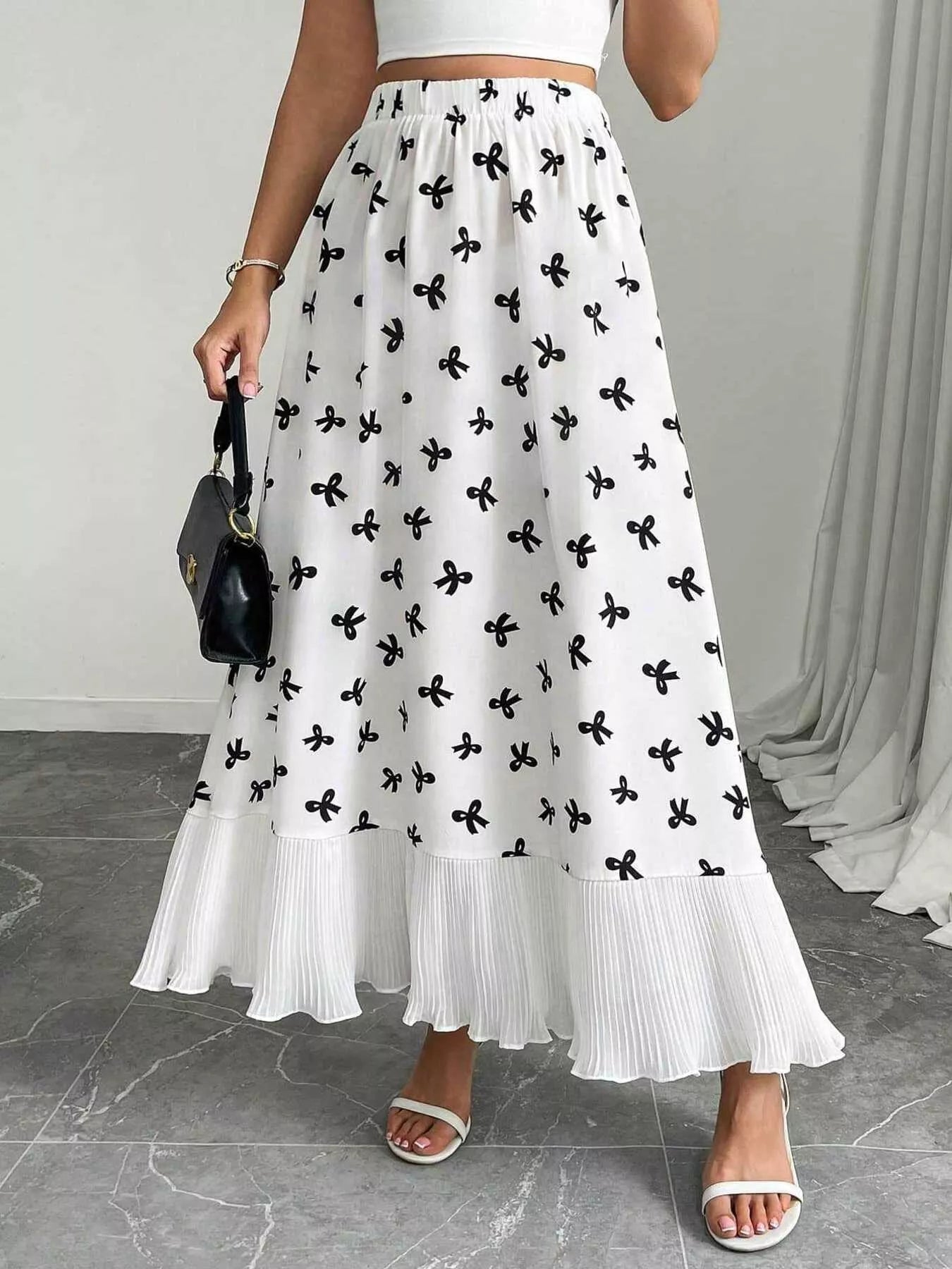 Bow Print Ruffle Hem Flowy Maxi Skirt designed for comfort and style at Lookzlike