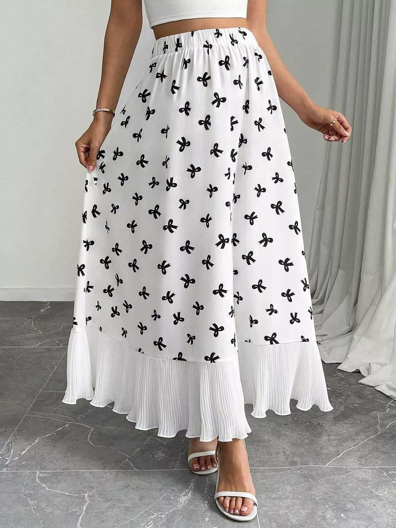 Bow Print Ruffle Hem Flowy Maxi Skirt designed for comfort and style at Lookzlike
