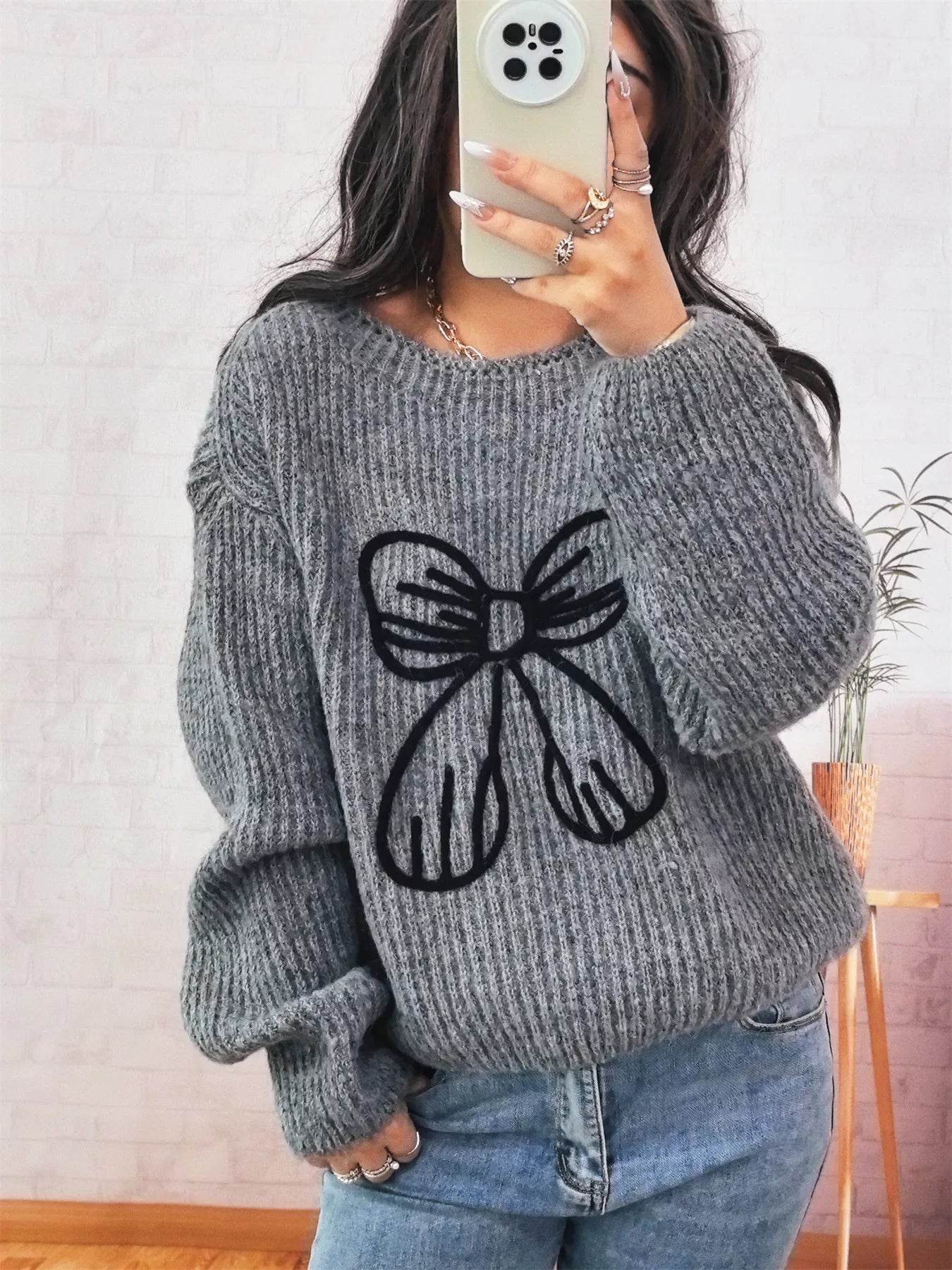 Bow Round Neck Long Sleeve Sweater designed for comfort and style at Lookzlike