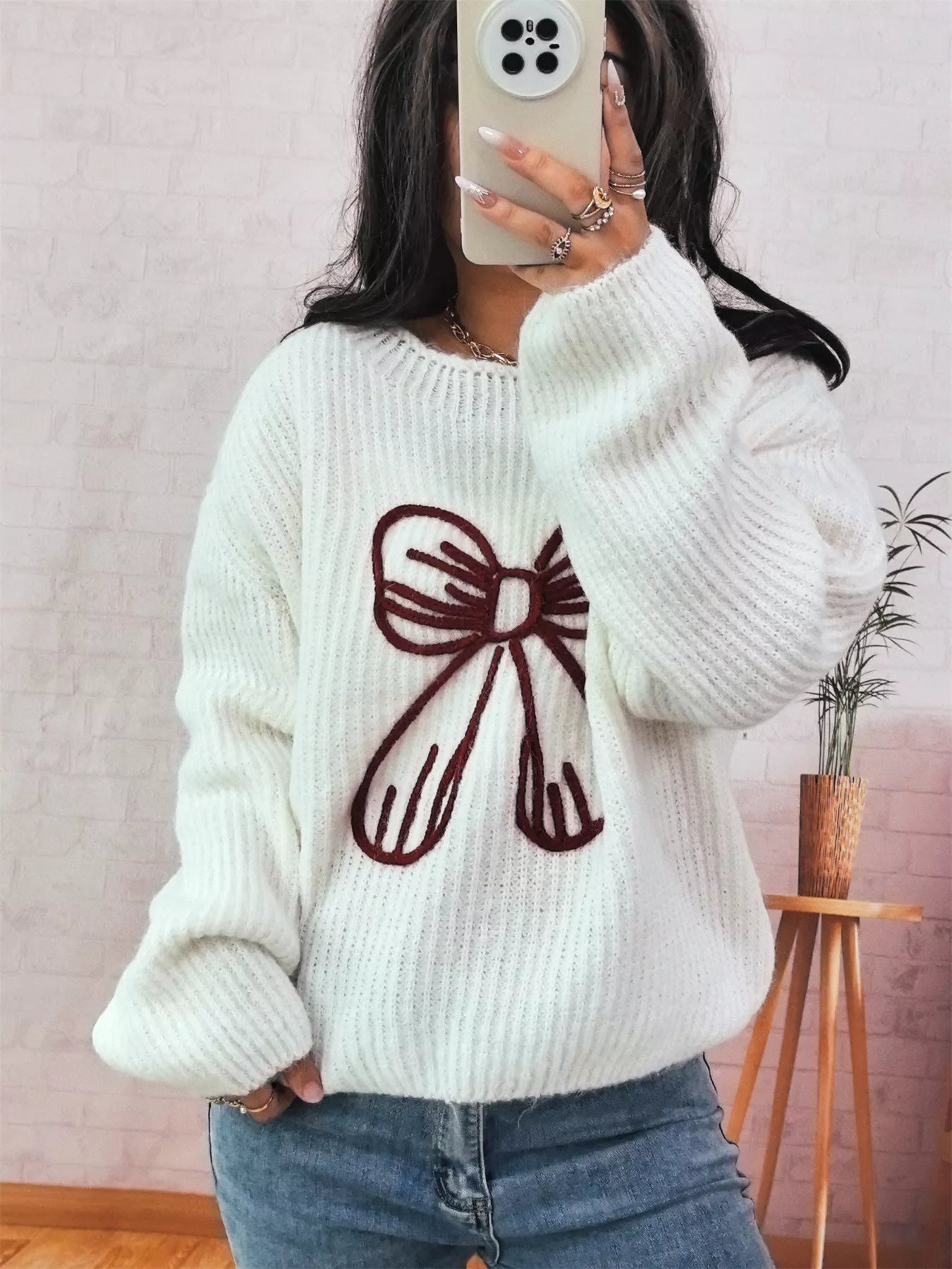 Bow Round Neck Long Sleeve Sweater designed for comfort and style at Lookzlike