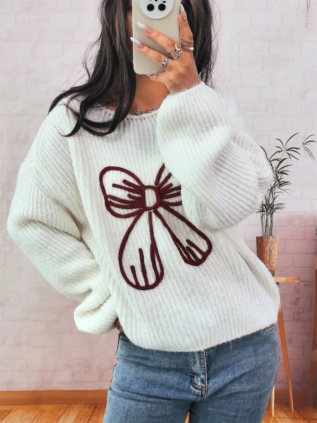 Bow Round Neck Long Sleeve Sweater designed for comfort and style at Lookzlike