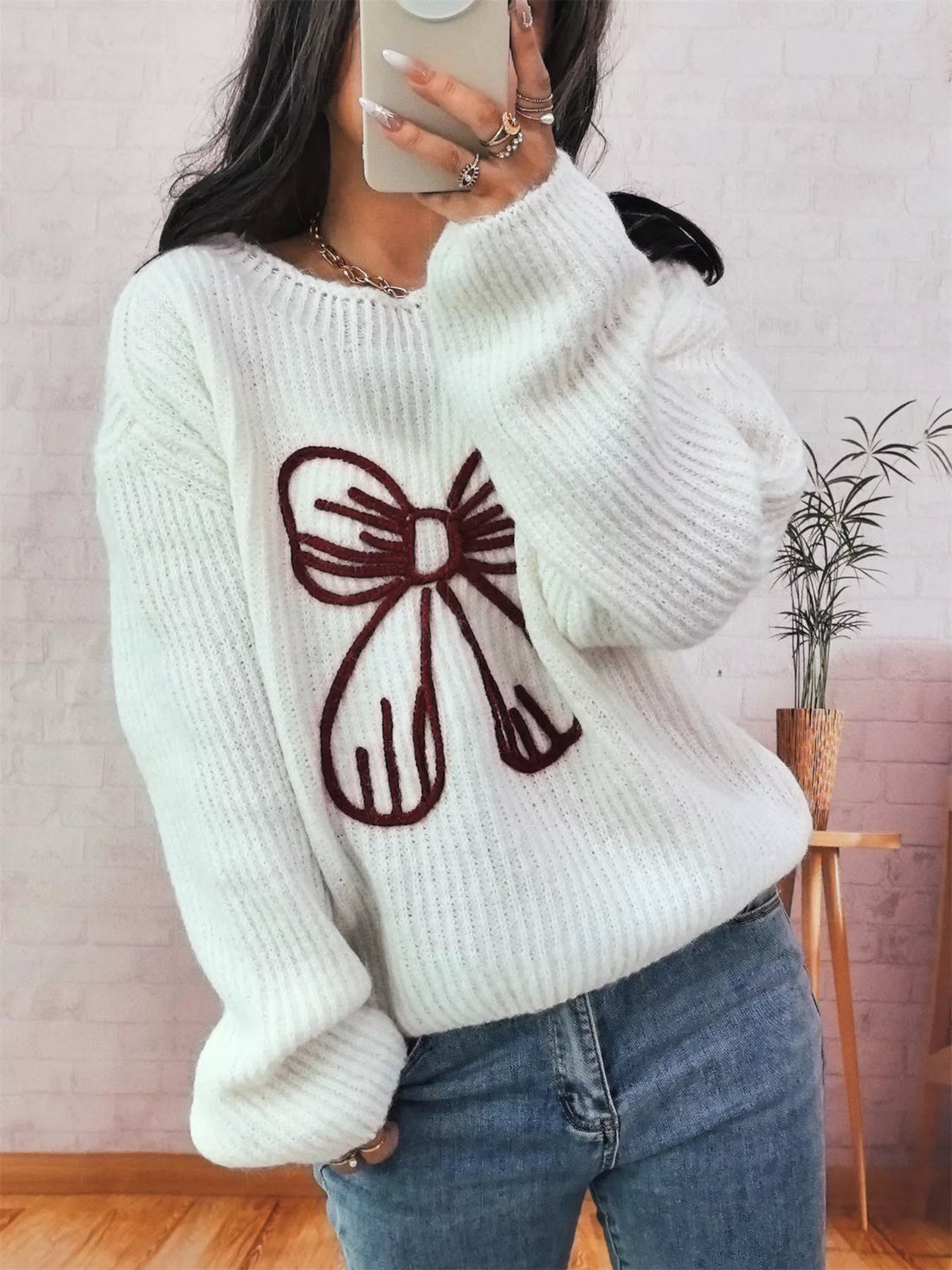 Bow Round Neck Long Sleeve Sweater designed for comfort and style at Lookzlike
