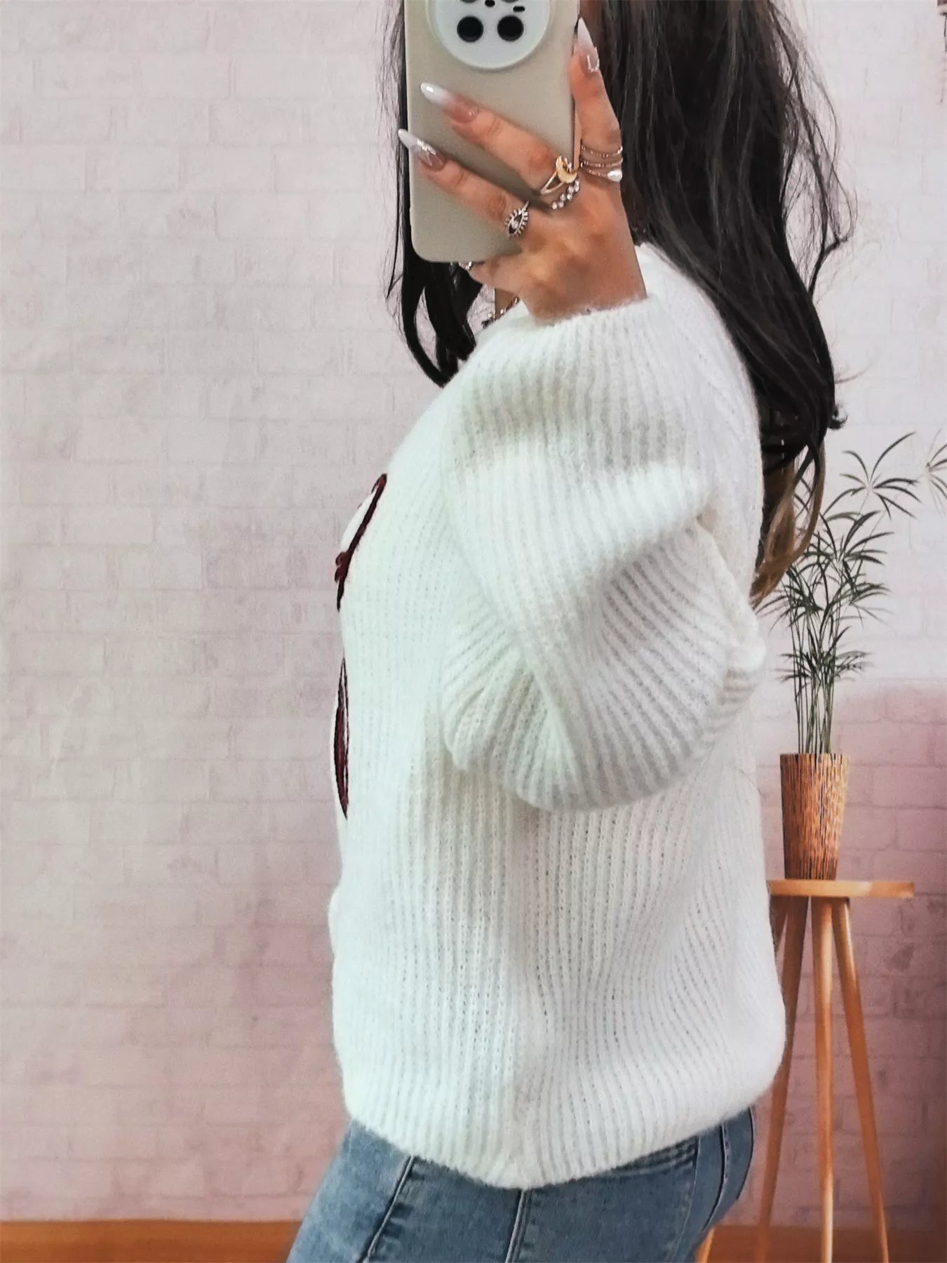 Bow Round Neck Long Sleeve Sweater designed for comfort and style at Lookzlike