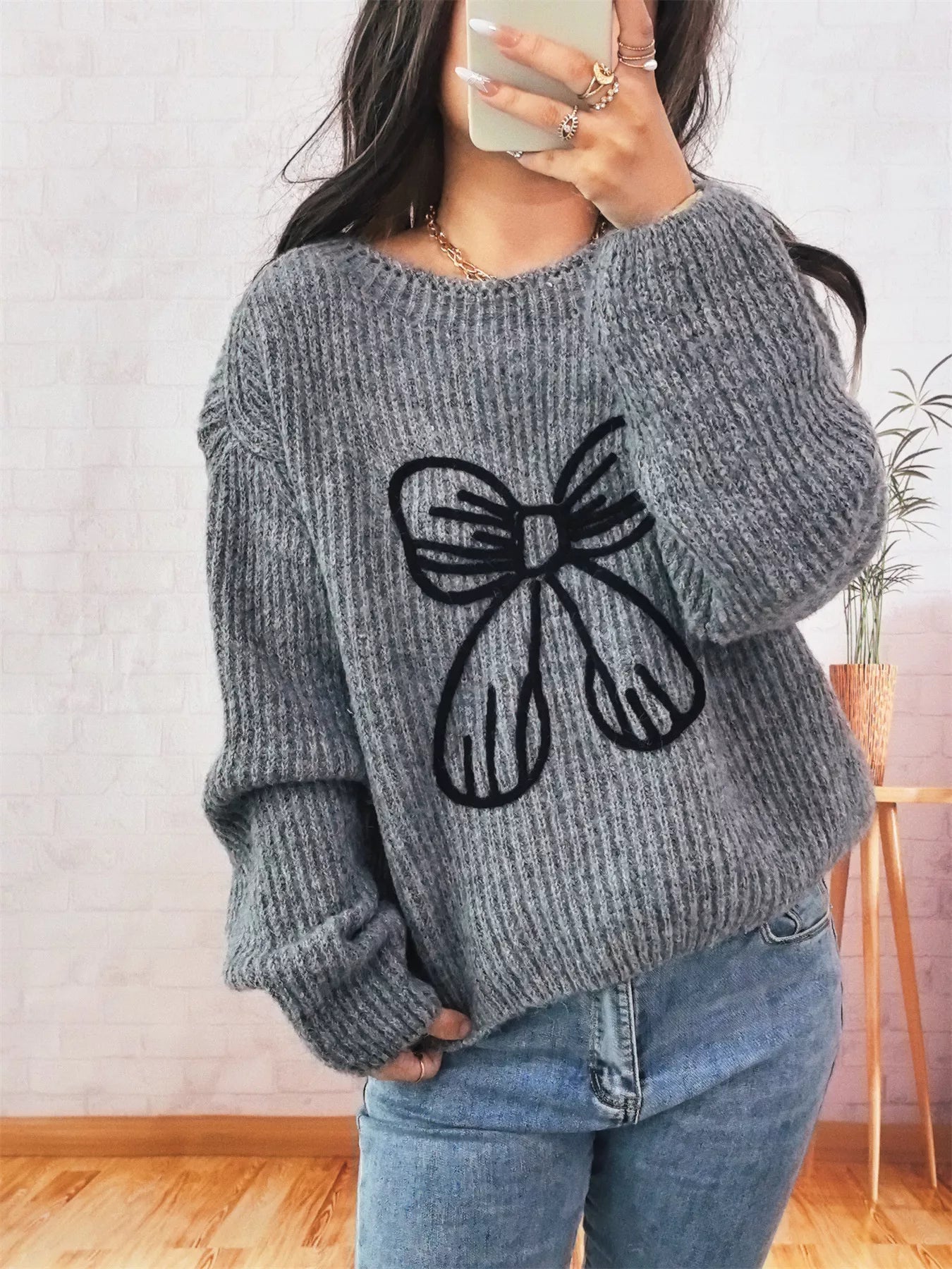 Bow Round Neck Long Sleeve Sweater designed for comfort and style at Lookzlike