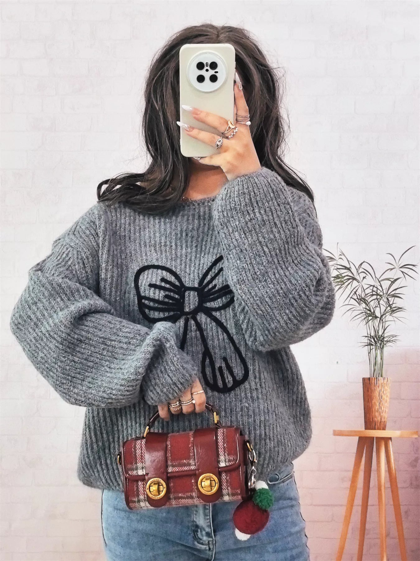 Bow Round Neck Long Sleeve Sweater designed for comfort and style at Lookzlike