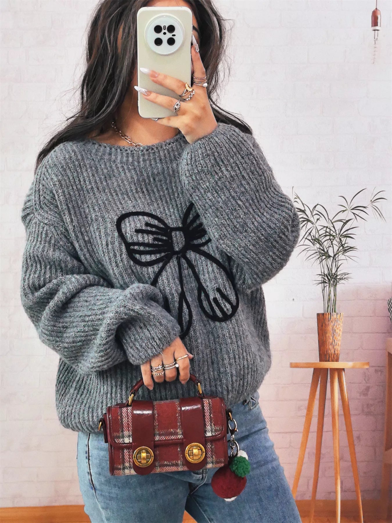 Bow Round Neck Long Sleeve Sweater designed for comfort and style at Lookzlike