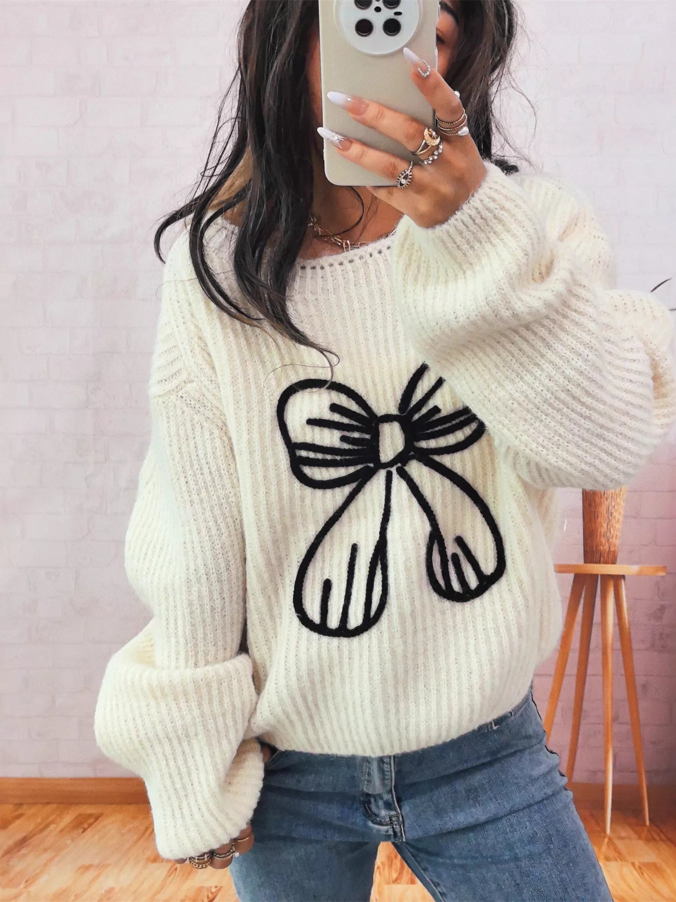Bow Round Neck Long Sleeve Sweater designed for comfort and style at Lookzlike