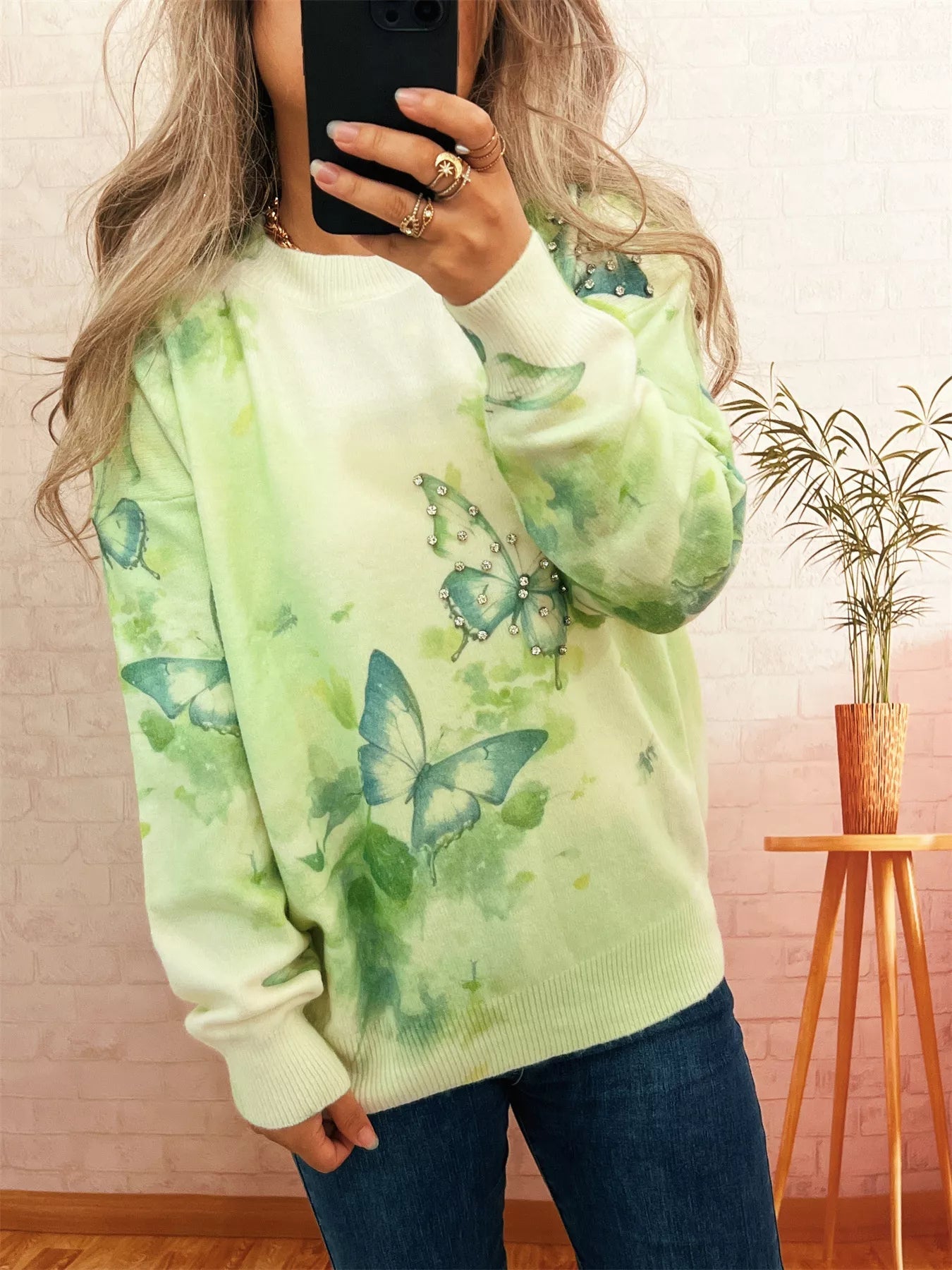 Butterfly Round Neck Lightweight Sweater designed for comfort and style at Lookzlike