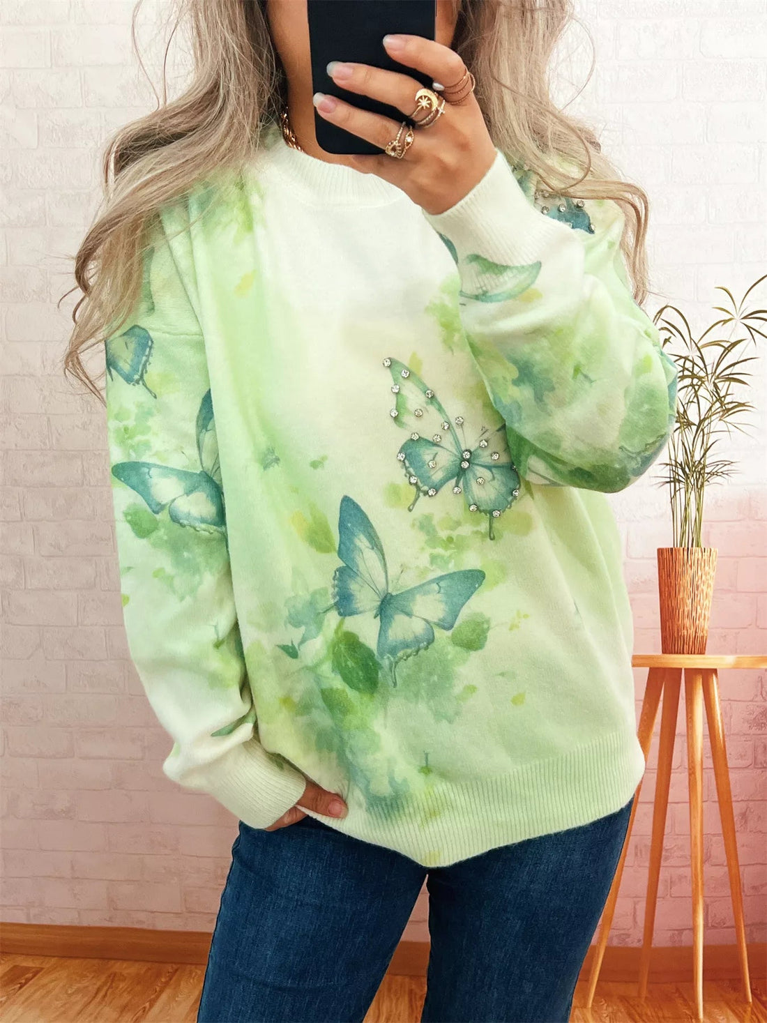 Butterfly Round Neck Lightweight Sweater designed for comfort and style at Lookzlike