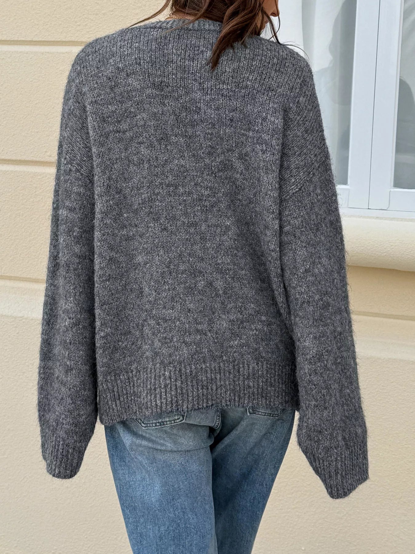 Button - Down Knit Cardigan designed for comfort and style at Lookzlike