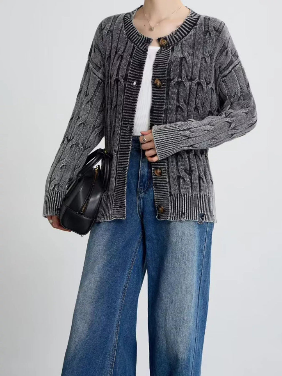 Cable Knit Button Up Cardigan designed for comfort and style at Lookzlike