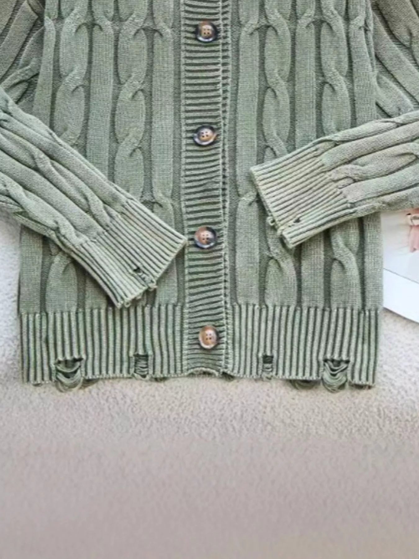 Cable Knit Button Up Cardigan designed for comfort and style at Lookzlike