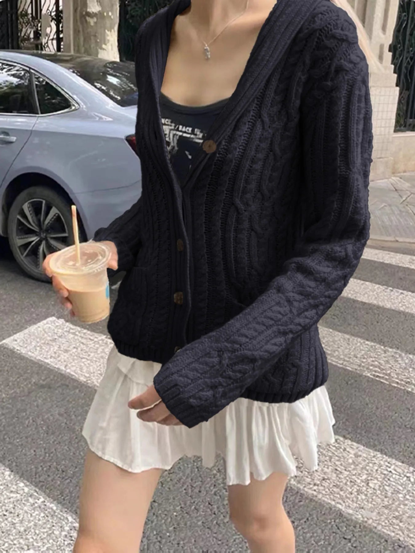 Cable Knit Button Up Cardigan designed for comfort and style at Lookzlike