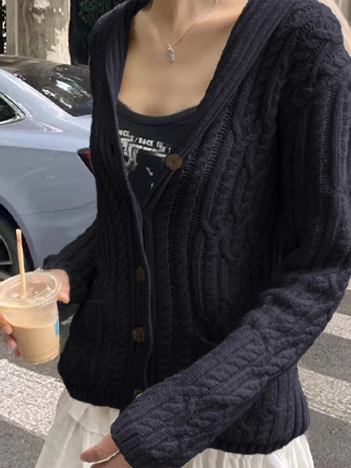 Cable Knit Button Up Cardigan designed for comfort and style at Lookzlike