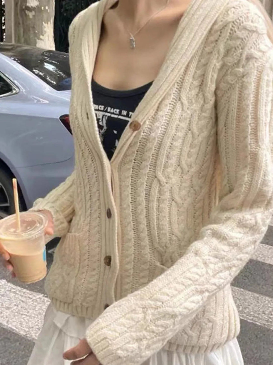 Cable Knit Button Up Cardigan designed for comfort and style at Lookzlike
