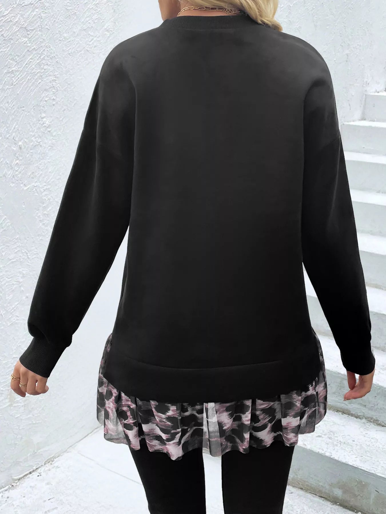 Camouflage Hem Detail Round Neck Sweatshirt designed for comfort and style at Lookzlike