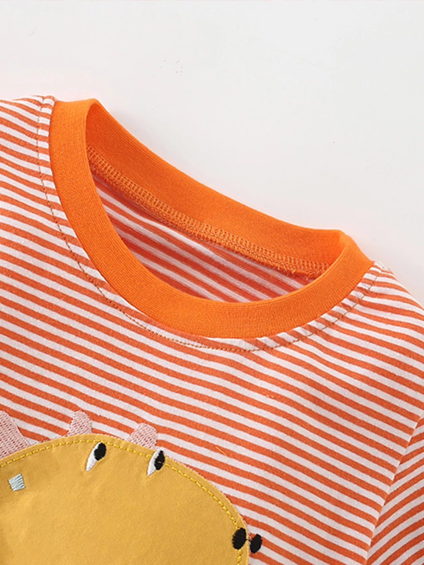 Children's Dinosaur Applique Striped T-Shirt designed for comfort and style at Lookzlike