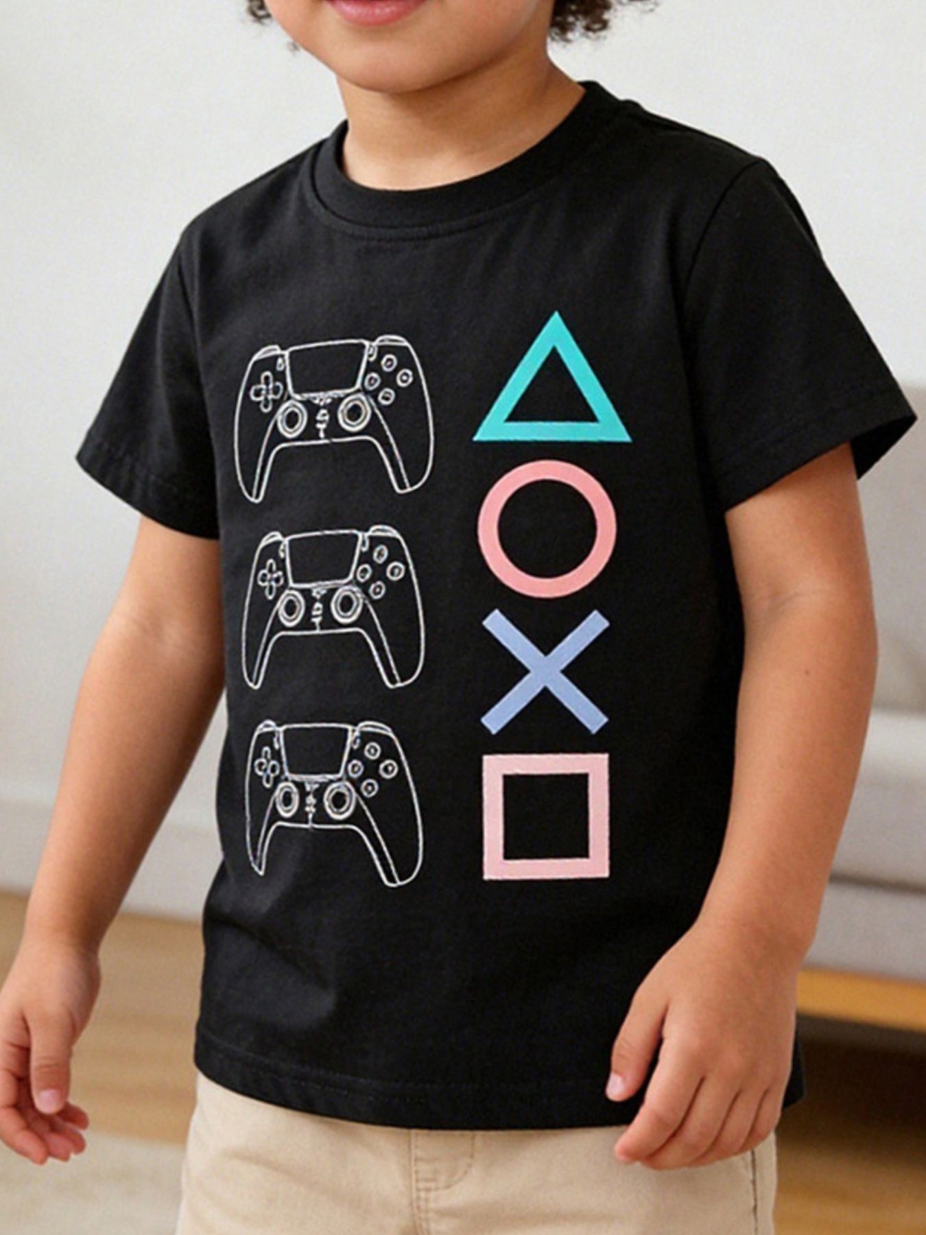 Children's Gaming Controller Graphic Round Neck T-Shirt designed for comfort and style at Lookzlike