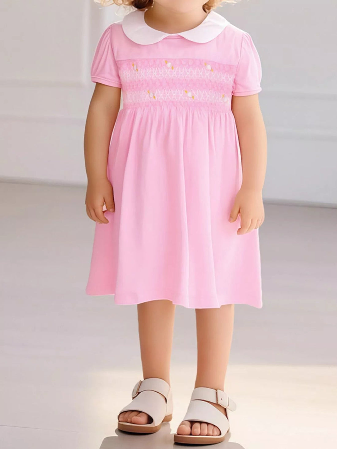 Children's Smocked Bodice Peter Pan Collar Dress designed for comfort and style at Lookzlike