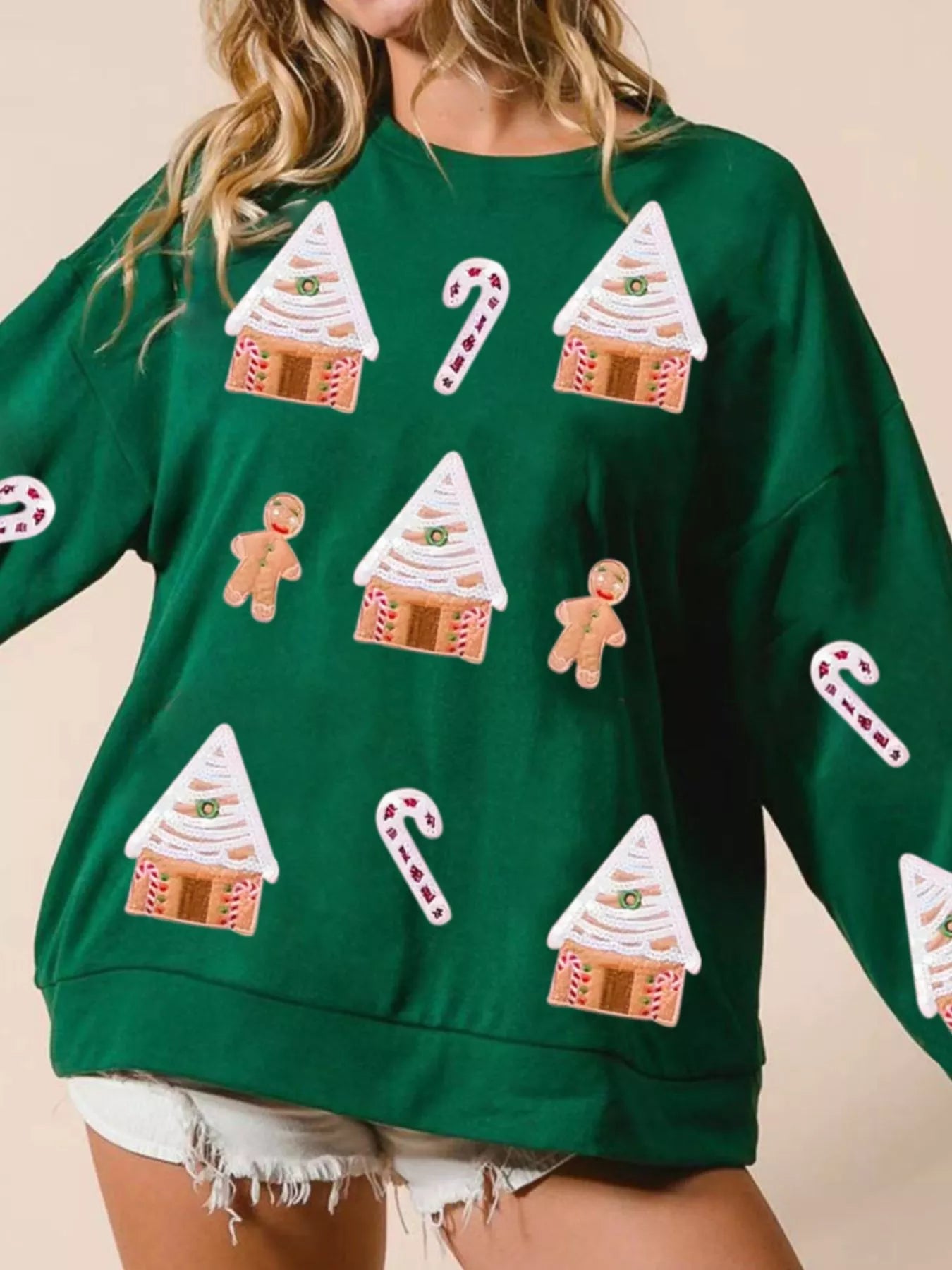 Christmas Gingerbread House Sequin Sweatshirt designed for comfort and style at Lookzlike