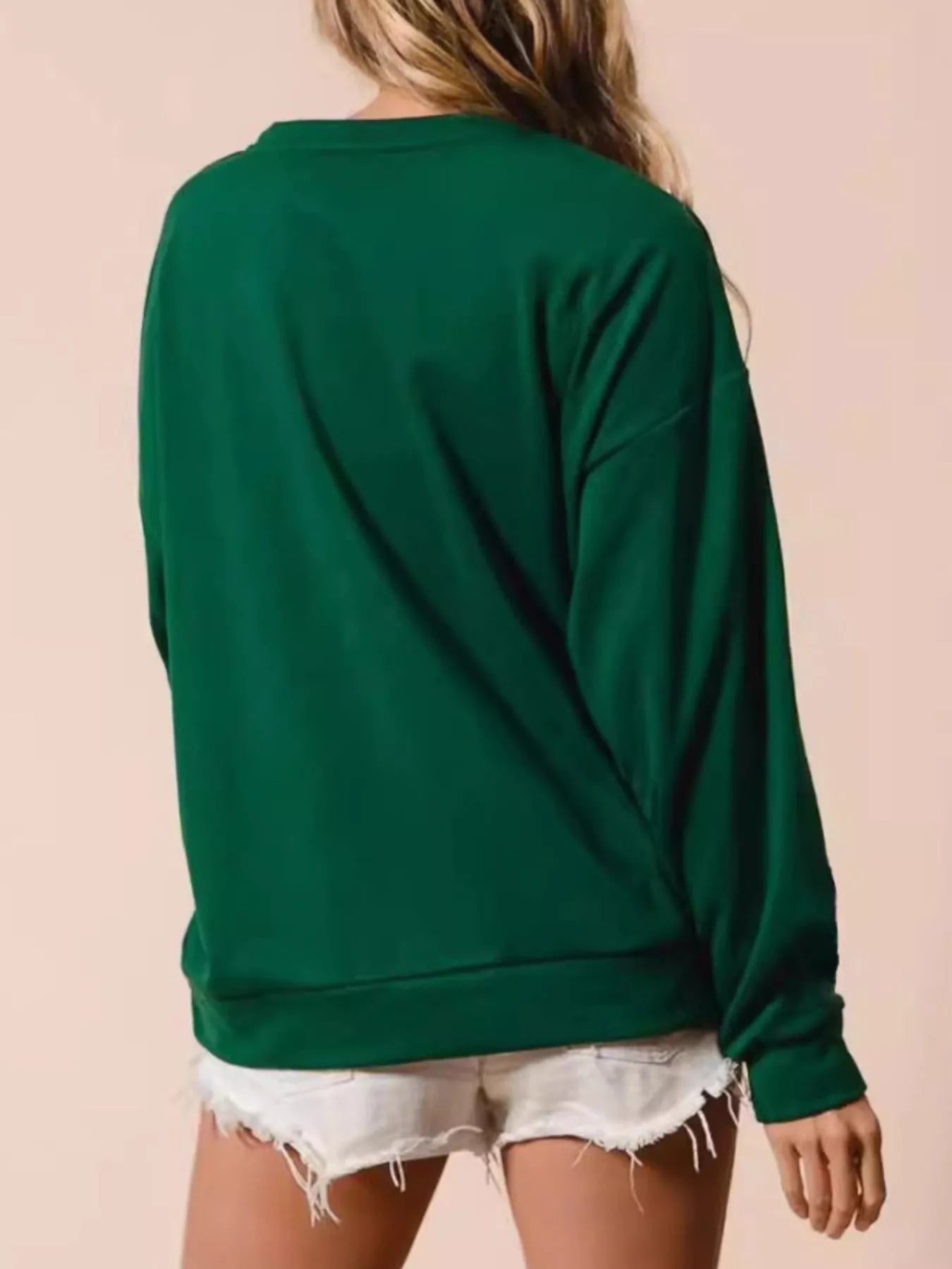 Christmas Gingerbread House Sequin Sweatshirt designed for comfort and style at Lookzlike
