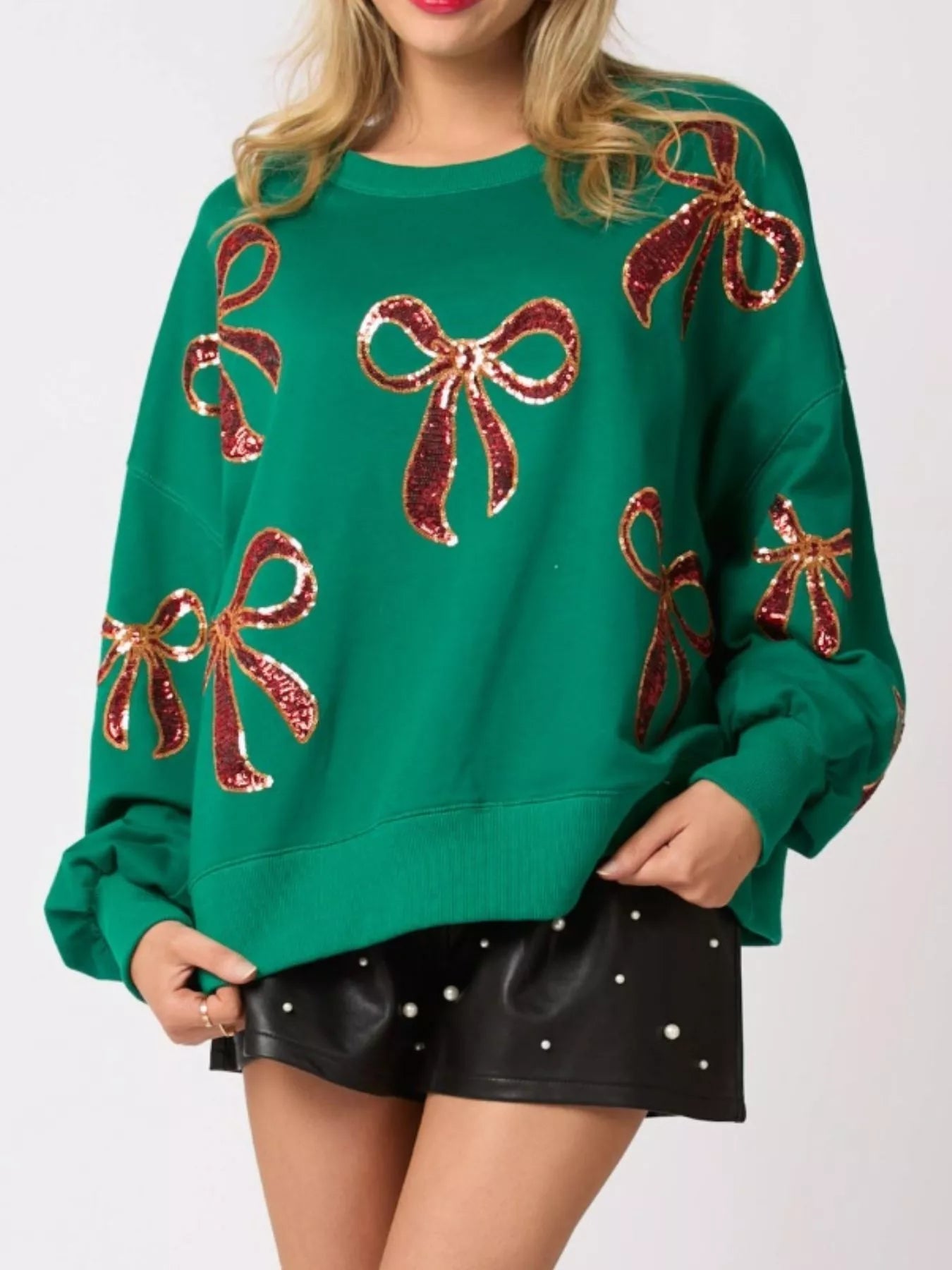 Christmas Sequin Bow Round Neck Sweatshirt designed for comfort and style at Lookzlike