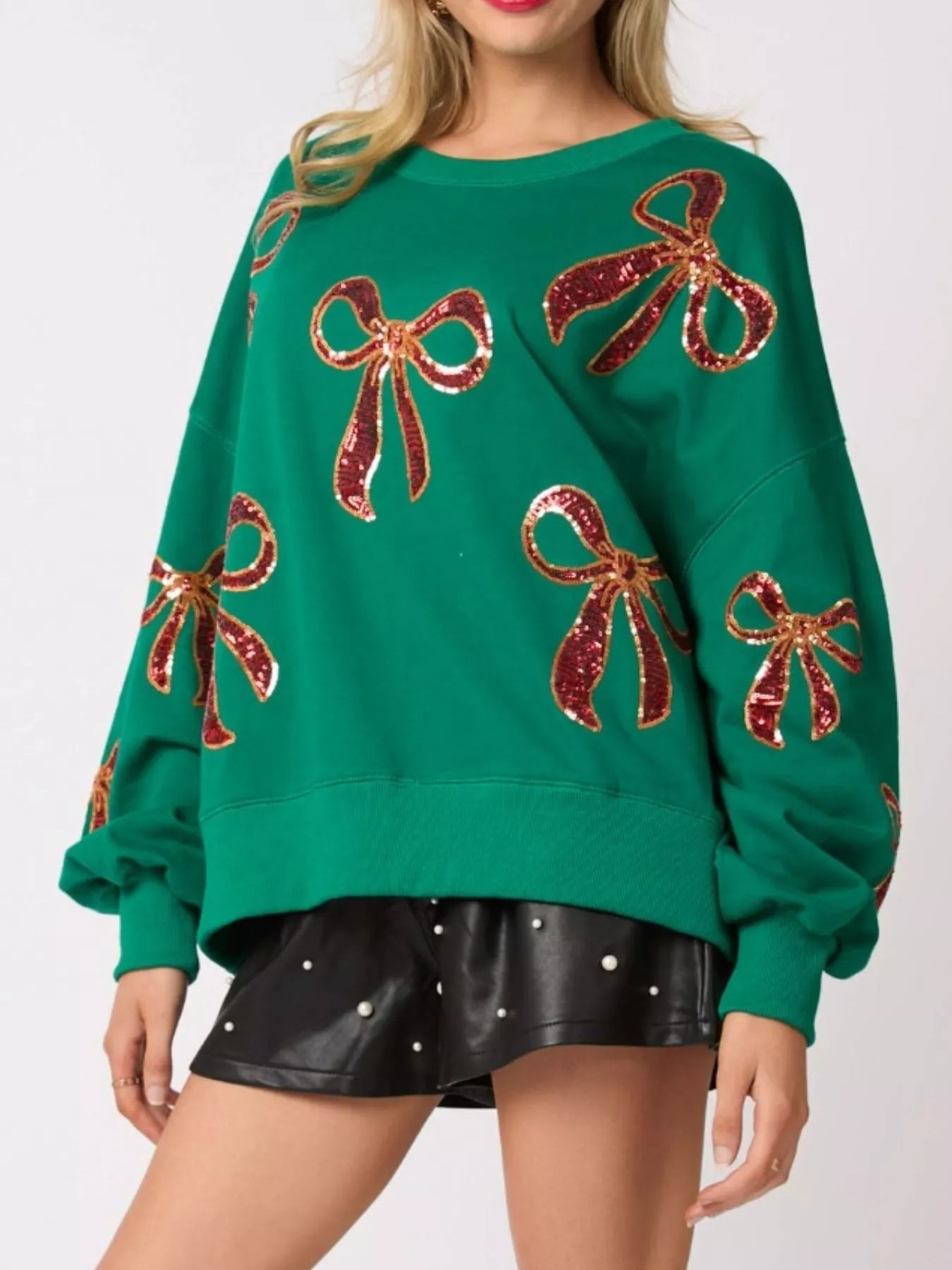 Christmas Sequin Bow Round Neck Sweatshirt designed for comfort and style at Lookzlike