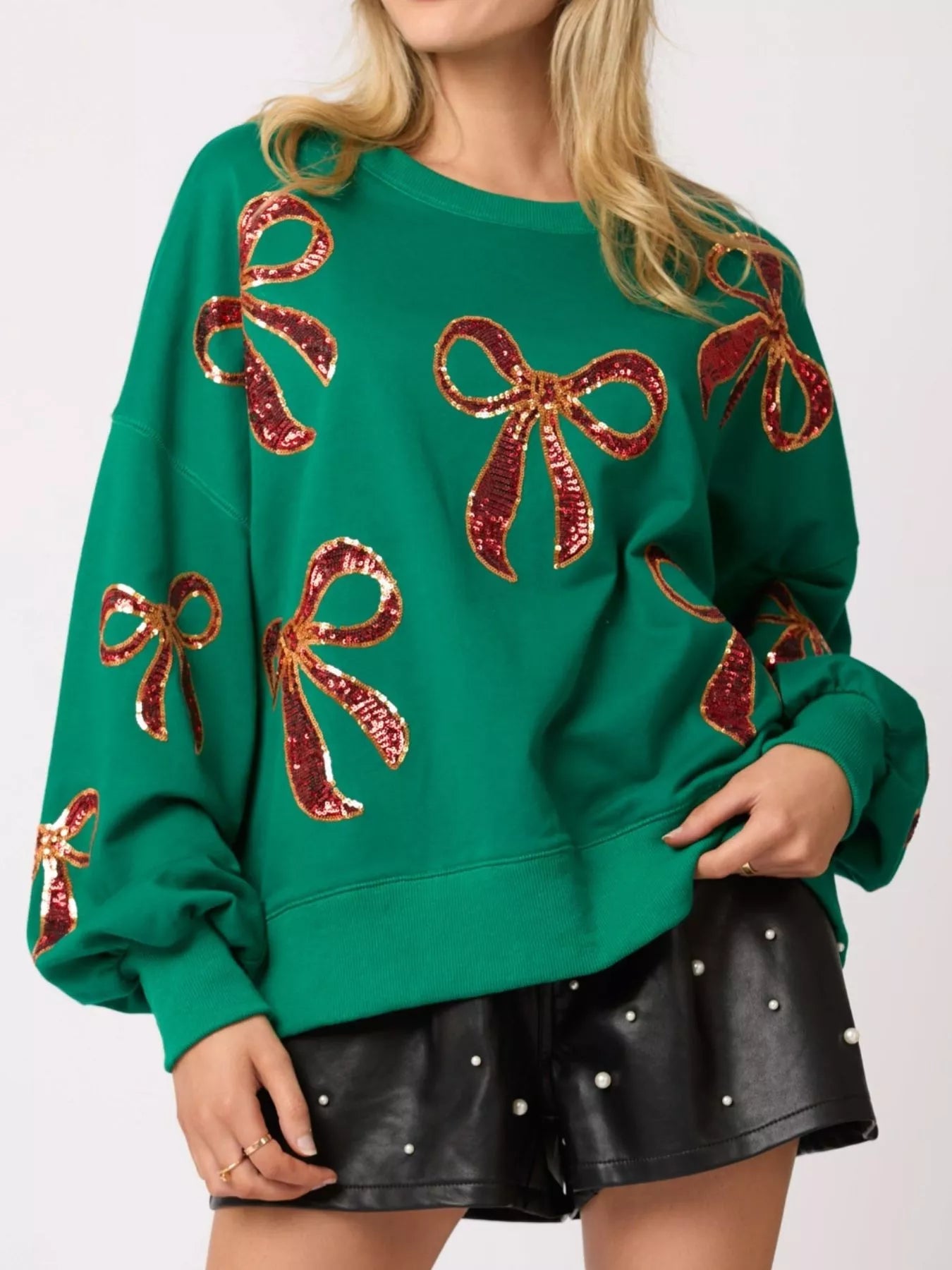 Christmas Sequin Bow Round Neck Sweatshirt designed for comfort and style at Lookzlike