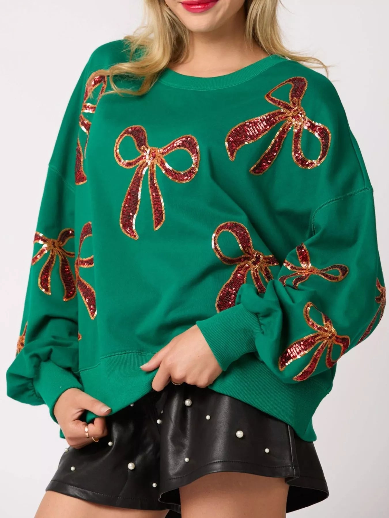 Christmas Sequin Bow Round Neck Sweatshirt designed for comfort and style at Lookzlike