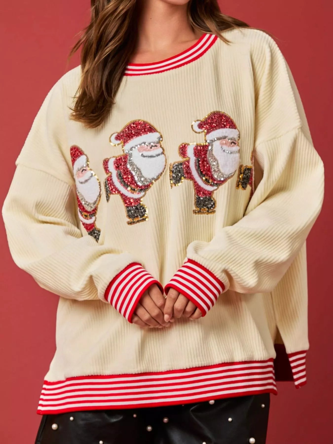 Christmas Sequin Candy Cane and Santa Sweatshirt with Striped Hem designed for comfort and style at Lookzlike