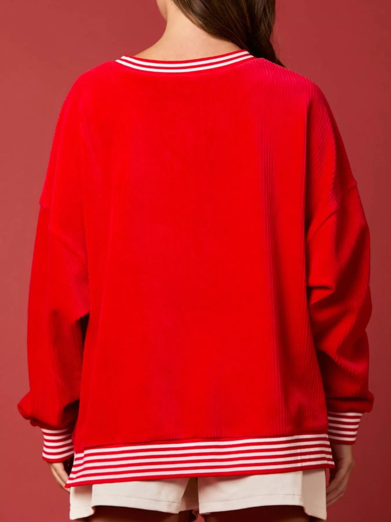 Christmas Sequin Candy Cane and Santa Sweatshirt with Striped Hem designed for comfort and style at Lookzlike