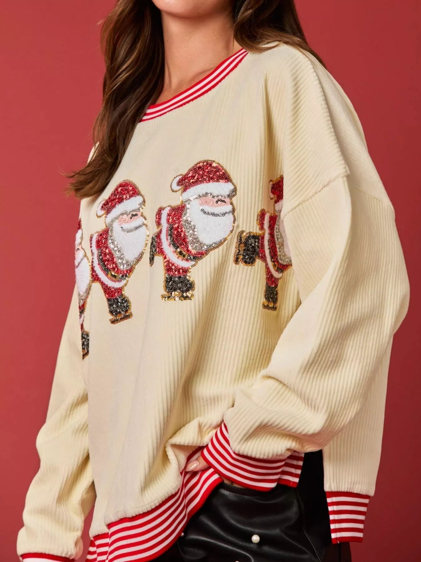 Christmas Sequin Candy Cane and Santa Sweatshirt with Striped Hem designed for comfort and style at Lookzlike