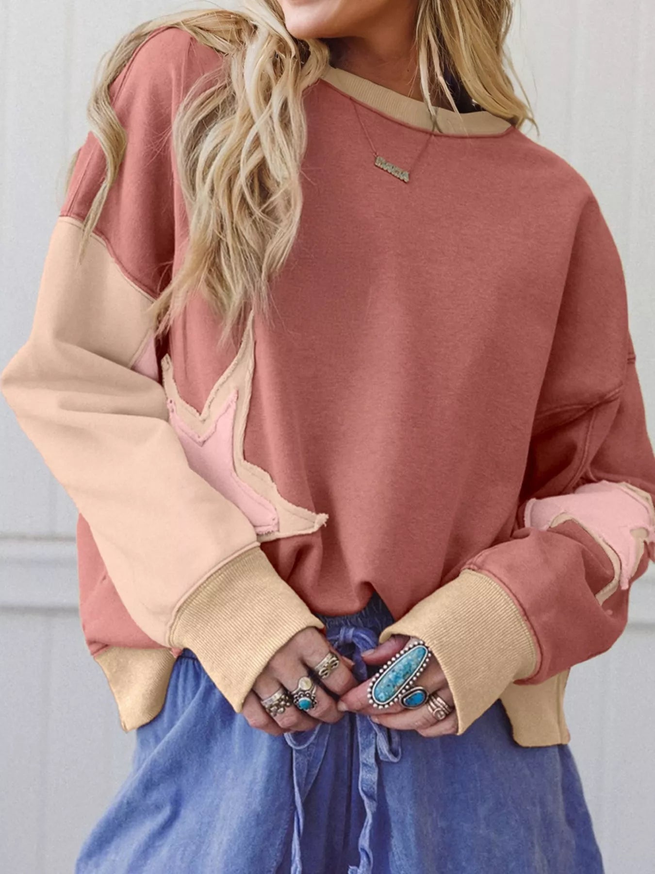 Contrast Star Patchwork Exposed Seam Uneven Hem Drop Shoulder Sweatshirt designed for comfort and style at Lookzlike