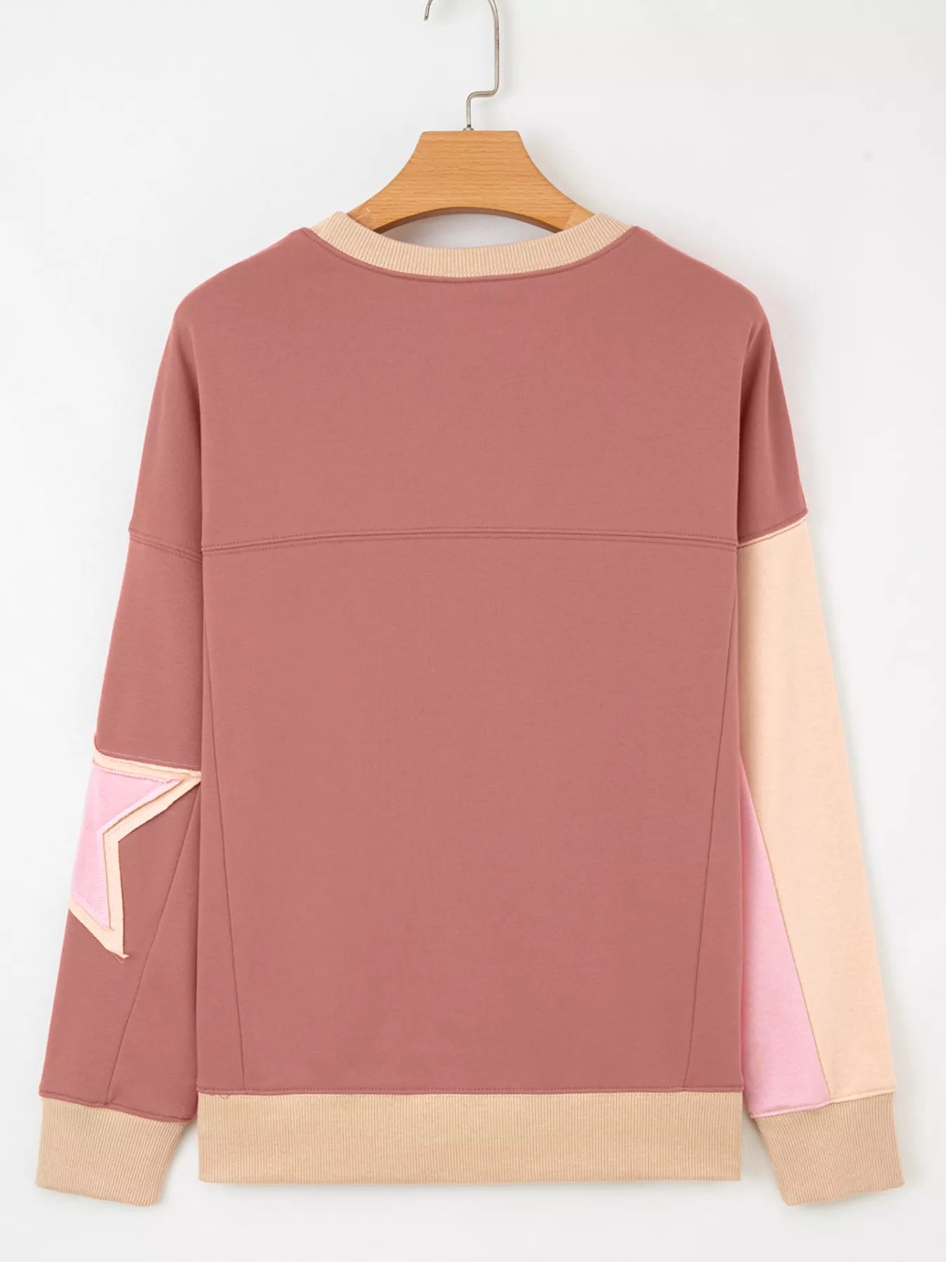 Contrast Star Patchwork Exposed Seam Uneven Hem Drop Shoulder Sweatshirt designed for comfort and style at Lookzlike