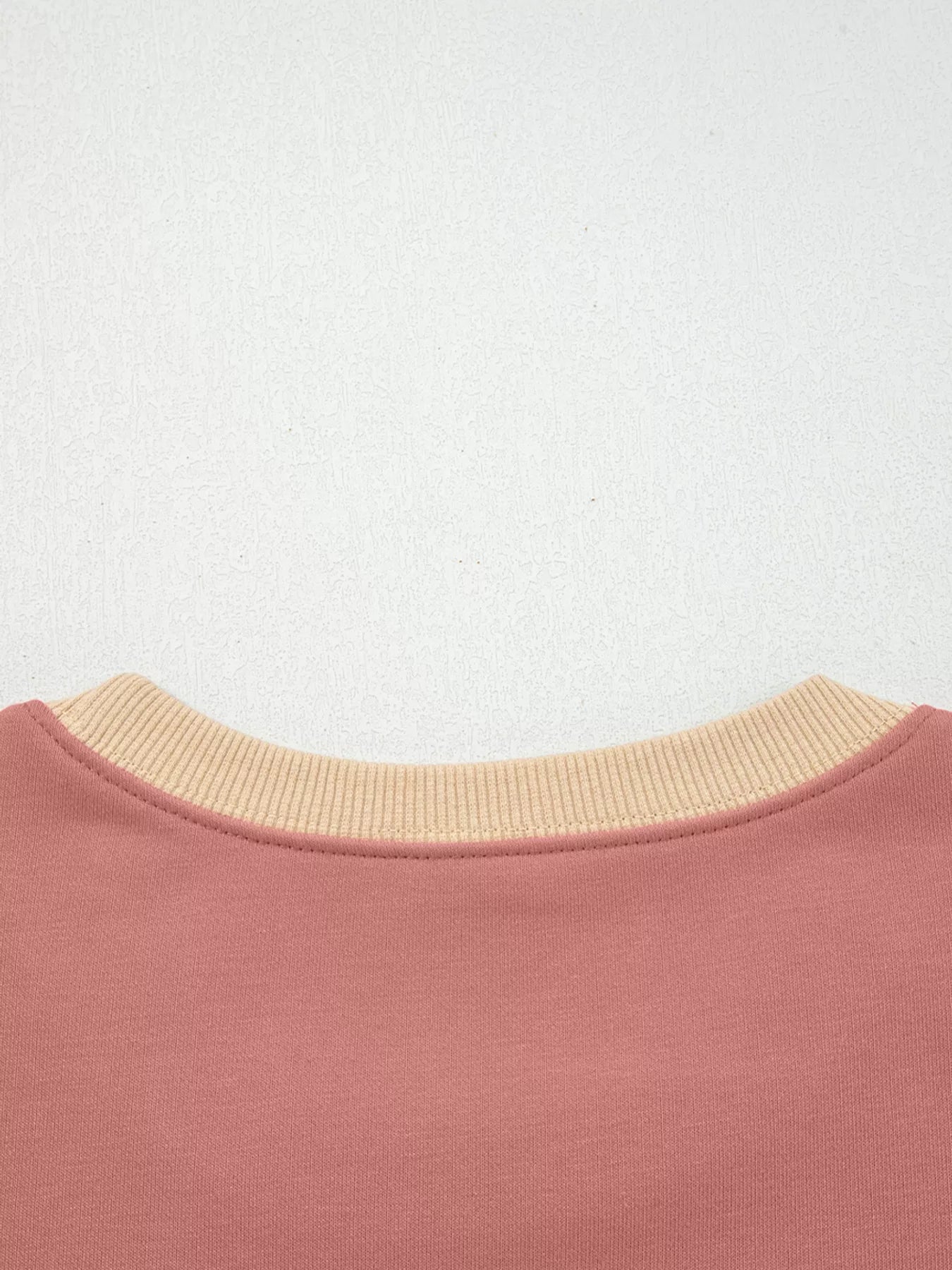 Contrast Star Patchwork Exposed Seam Uneven Hem Drop Shoulder Sweatshirt designed for comfort and style at Lookzlike