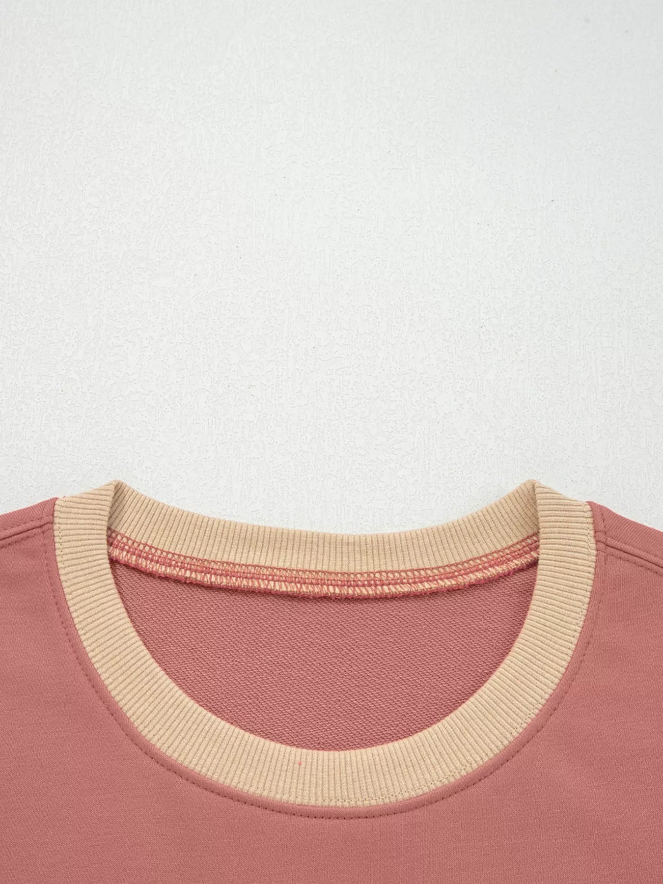 Contrast Star Patchwork Exposed Seam Uneven Hem Drop Shoulder Sweatshirt designed for comfort and style at Lookzlike