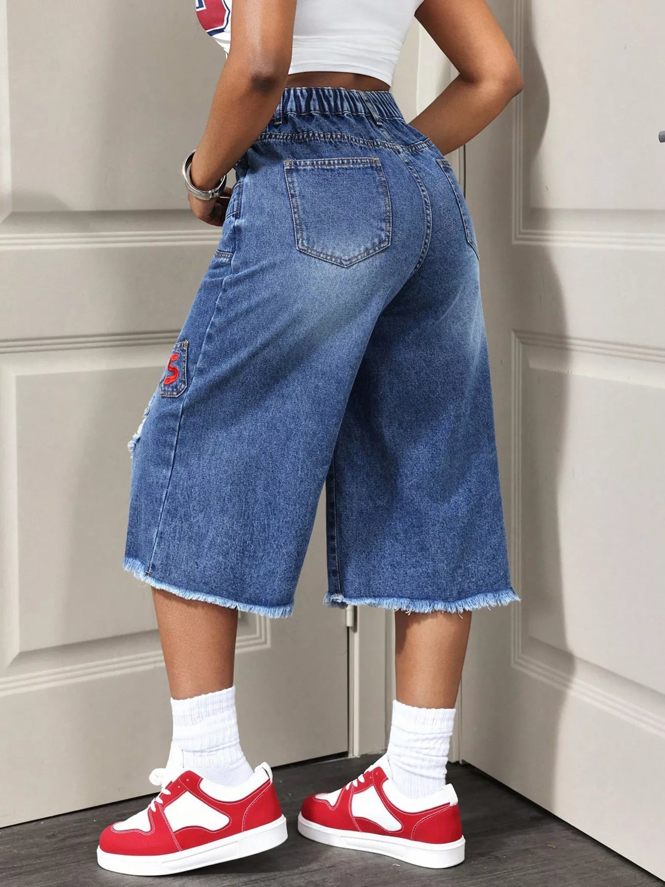 Distressed Wide-Leg Denim Capris designed for comfort and style at Lookzlike