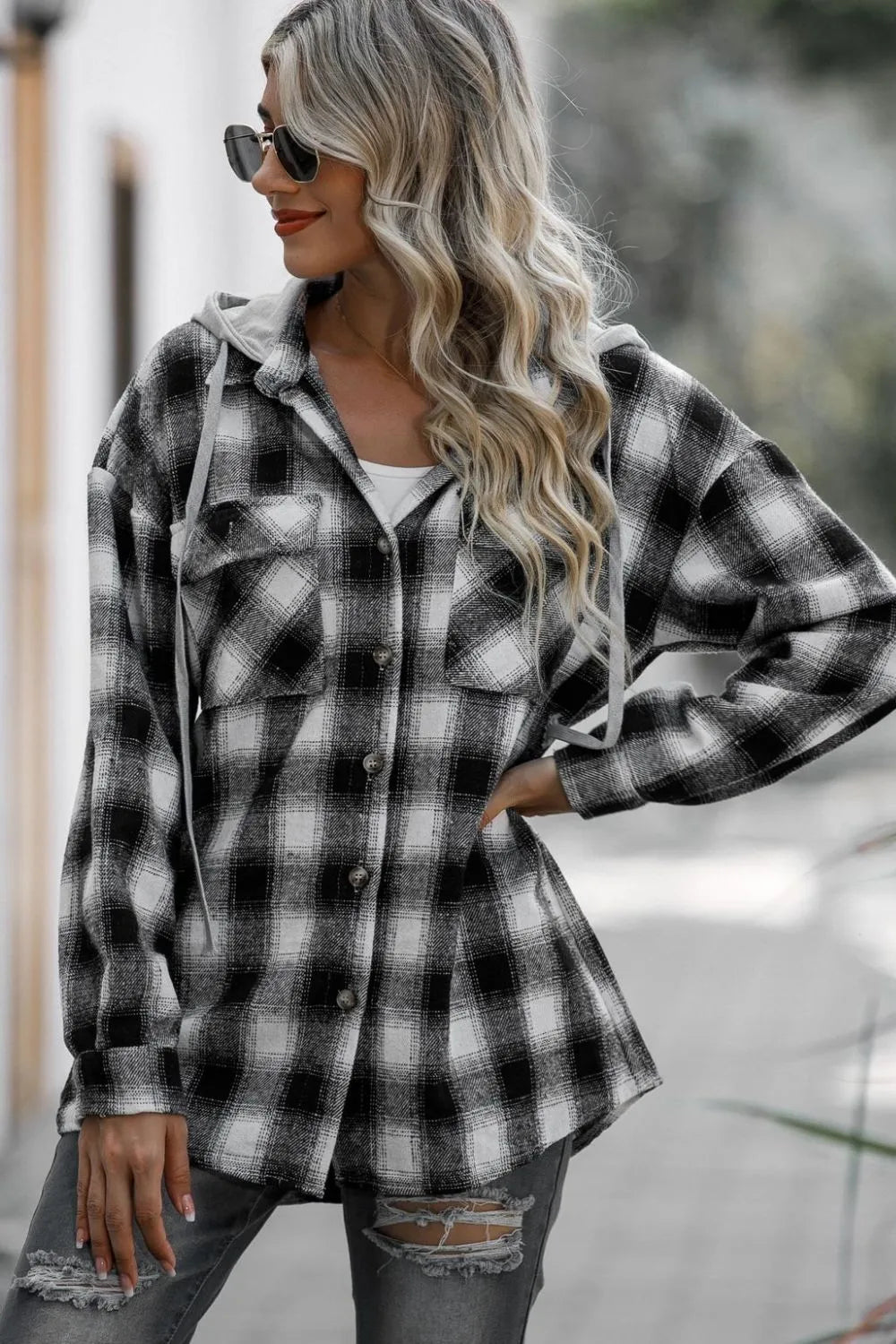 Double Take Drawstring Plaid Long Sleeve Hooded Shacket designed for comfort and style at Lookzlike